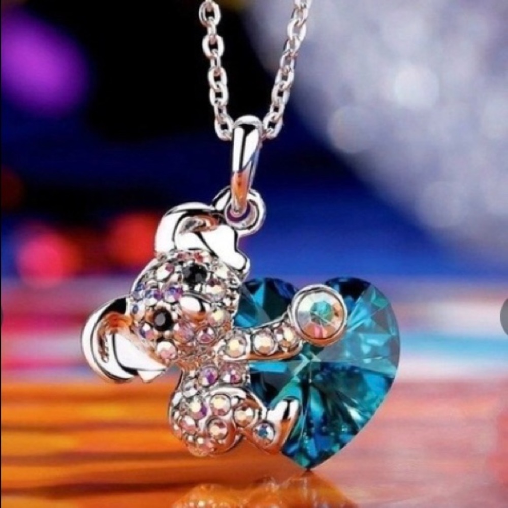 Koala Holding A Blue Crystal Heart Pendant necklace